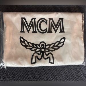 MCM White and Black XL dust bag.